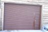 Roller shutter with wicket gate,chain operation.
