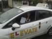 Elevate Driving School logo