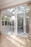 Looking Though PVCu Bi-Fold Door Into PVCu Orangery