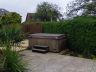 In this landscaping project a decking and paving area was constructed to create a low maintenance ga