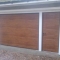 Golden Oak sectional door and matching pedestrian door