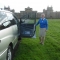 Robina Brown with her car at Blenheim Palace