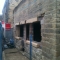 converting a stone 1800s barn to a shop, keeping up with local buildings