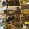 Brass sheet metal display housings waiting to be welded