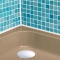 'Storm Grey' shower tray with blue tiles - bathroom interior design idea by Colour Trays.
