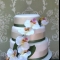 wedding cake, flowers to match brides