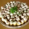 Baby potatoes topped with cream cheese, diced ham and fresh chives