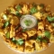 Baby onion bhajis served with a mint, garlic and onion raita