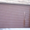 Roller shutter with wicket gate,chain operation.