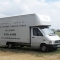 Woodbridge Removal's van and Stonehenge