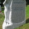 Memorial with carved figure