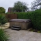 In this landscaping project a decking and paving area was constructed to create a low maintenance ga