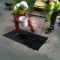 permanent pothole repair being carried out in carriageway using GreenPatch Permanent Pothole 
