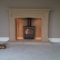 Clearview log burner, stone fireplace