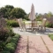 A sunny sitting area surrounded by plants