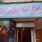 Front of shop sign.