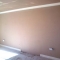 fire place removed, capped, insulated, bricked up, rendered and full wall skimmed to that flat finis