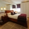 Mahogany sleigh bed with matching furniture.
