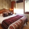 Stunning French Rococo Bed in a Honey finish.