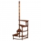 Each of the four treads is inlaid with attractive burr walnut veneers.