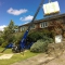 Spider crane lifting hot tub