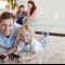 dad-and-daughter-playing-on-rug-min