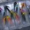 A selection of salmon minitube flies dressed on Grays Needle Tubes