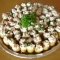 Baby potatoes topped with cream cheese, diced ham and fresh chives