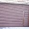 Roller shutter with wicket gate,chain operation.