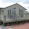 An example of some caravan decking and glazing that Summerdecks has done.