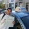 Atif - holding his driving certificate